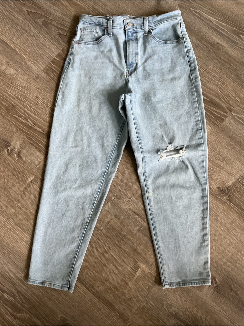 Levi’s Light Wash High-Rise Mom Jeans with Knee Rip